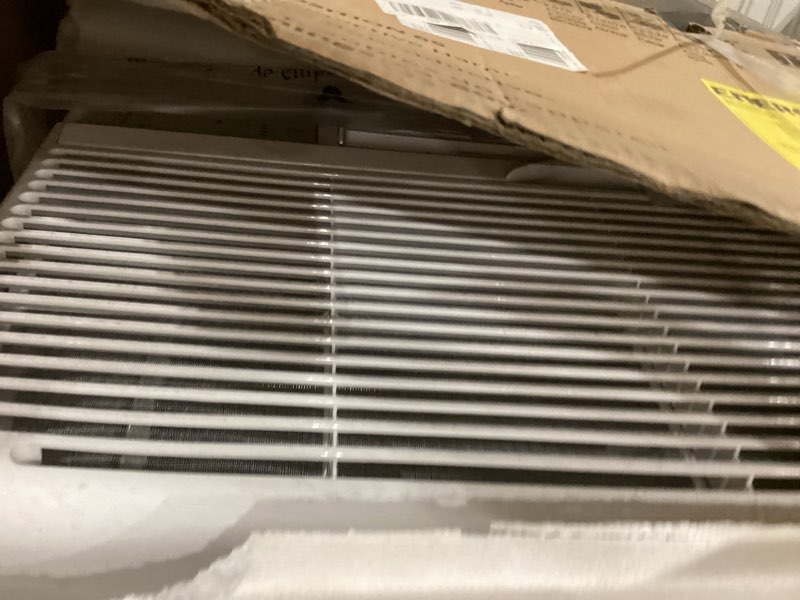 Condition photo showing As Is for Keystone 12,000 BTU Wall Air Conditioner with Dehumidifier and Supplemental Heat, 230V, Quiet Wall AC for Small and Medium Sized Rooms up to 550 Sq.Ft. with Remote Control, White 12000 BTU Heat/Cool 230V White
