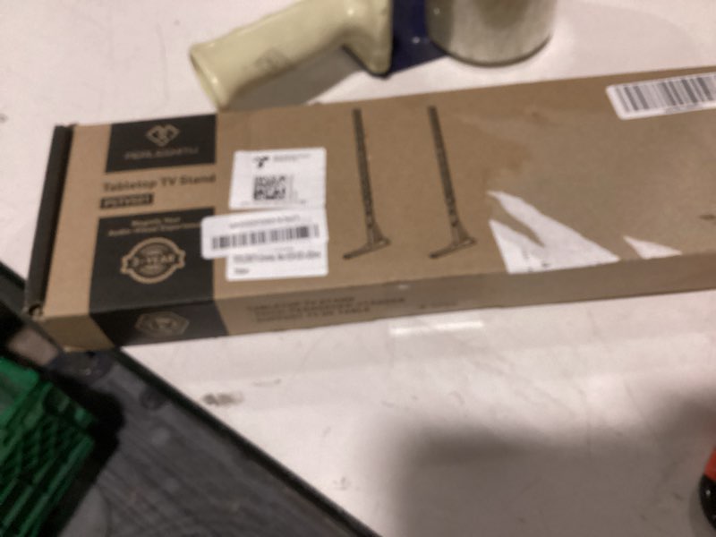 Condition photo showing As Is for perlesmith universal tv stand mount for 20-75 inch tvs, height adjustable table top tv stand, great load-bearing replacement tv legs with steel holds up to 110lbs, max vesa 800 x 600mm pstvs01