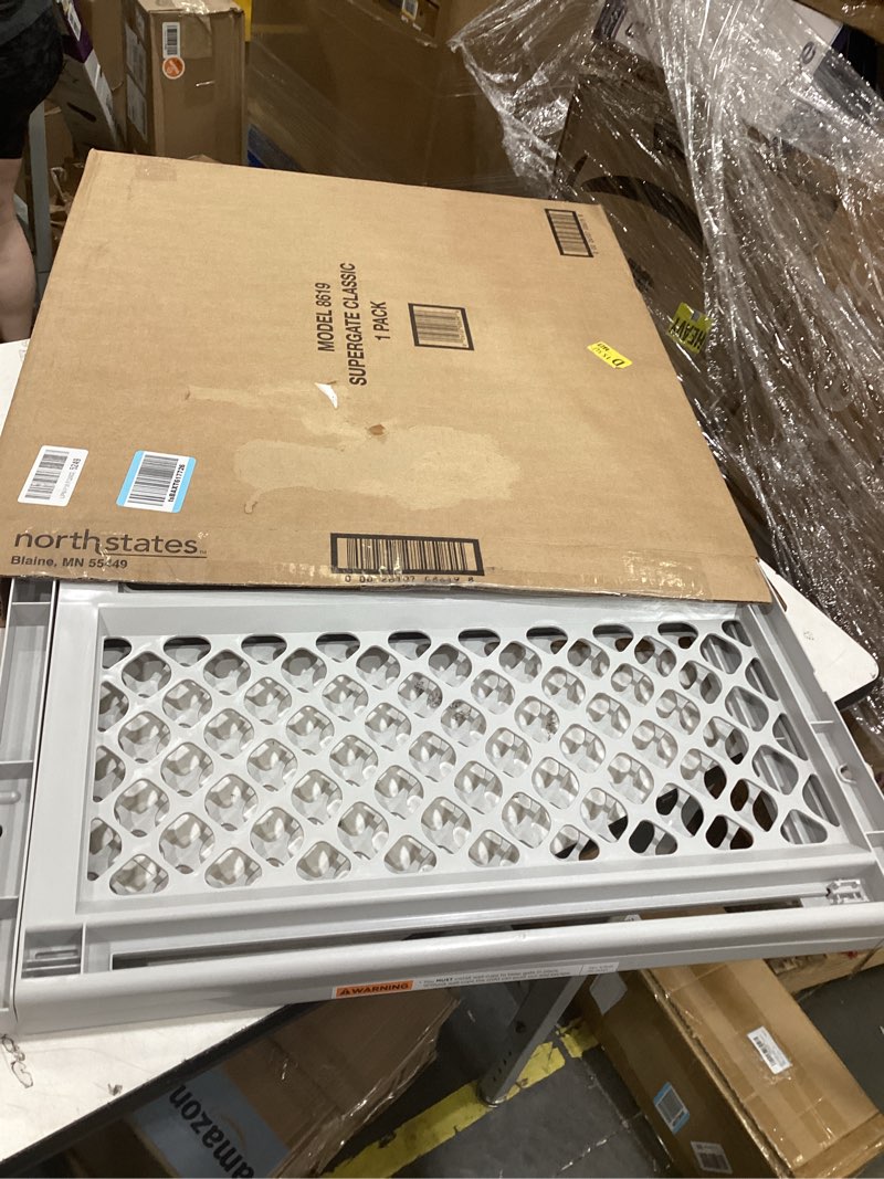 Condition photo showing Good Condition for mypet universal pet gate: 26” - 42” wide dog gate for doorways with pressure fit or swinging door hardware mounting types included: 26" tall; gray