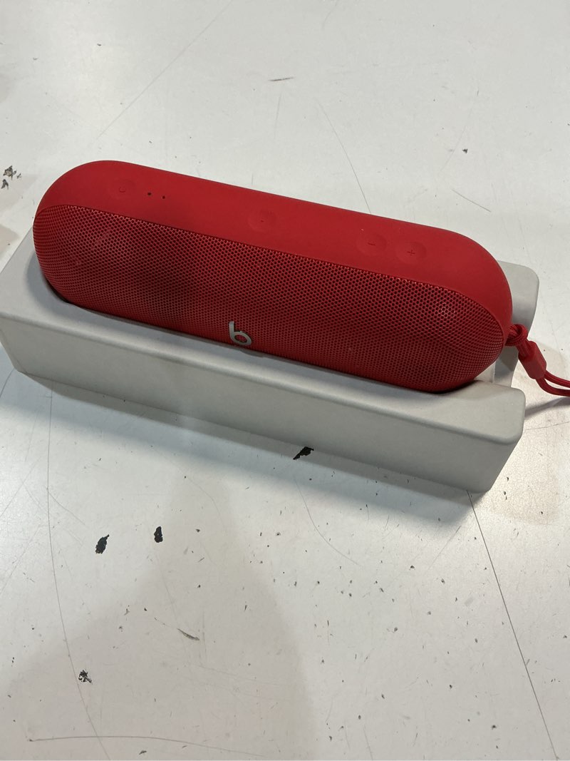 Condition photo showing As Is for beats pill - portable bluetooth speaker - up to 24h battery life, water resistant, bluetooth, apple & android compatible, seriously loud sound for home, outdoor and travel – statement red statement red standalone