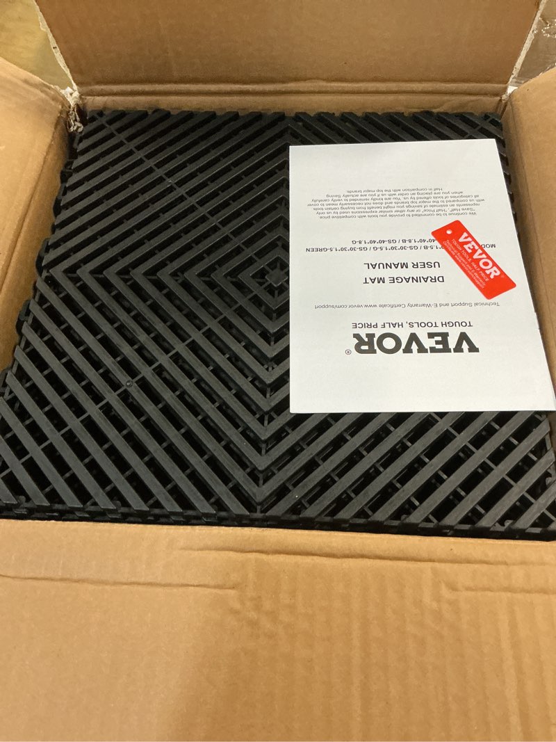 Condition photo showing Good Condition for VEVOR Interlocking Drainage Mat, 12” x 12” Modular Interlocking Cushion, 12 Pcs Splicing Drainage Mats, Non-Slip Black PP Drainage Floor Tile and Shower Mat, for Garage, Garden, Kitchen & Outdoor Black 12 PCS