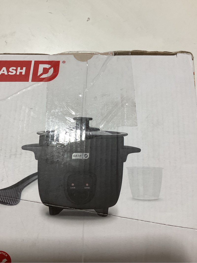 Condition photo showing New/Like New for DASH Mini Rice Cooker Steamer with Removable Nonstick Pot, Keep Warm Function & Recipe Guide, One Half Quart, for Soups, Stews, Grains & Oatmeal - Black Mini Rice Cooker with Keep Warm BLACK