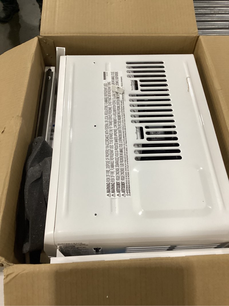 Condition photo showing As Is for **not tested**lg 6,000 btu window air conditioner, cools 250 sq.ft. (10' x 25' room size), quiet operation, electronic control with remote, 2 cooling & fan speeds, 2-way air deflection, auto restart, 115v 6000 btu electronic & standard bright white