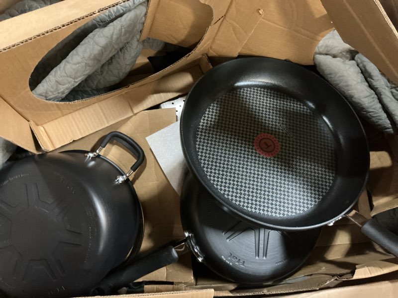 Condition photo showing As Is for T-Fal Ultimate Hard Anodized Nonstick Cookware Set 17 Piece, Nonstick Pots and Pans Set with Fry Pan, Saucepans, Saute-Pan, Griddle, Dishwasher Safe, Black Hard Anodized Nonstick 17-Piece