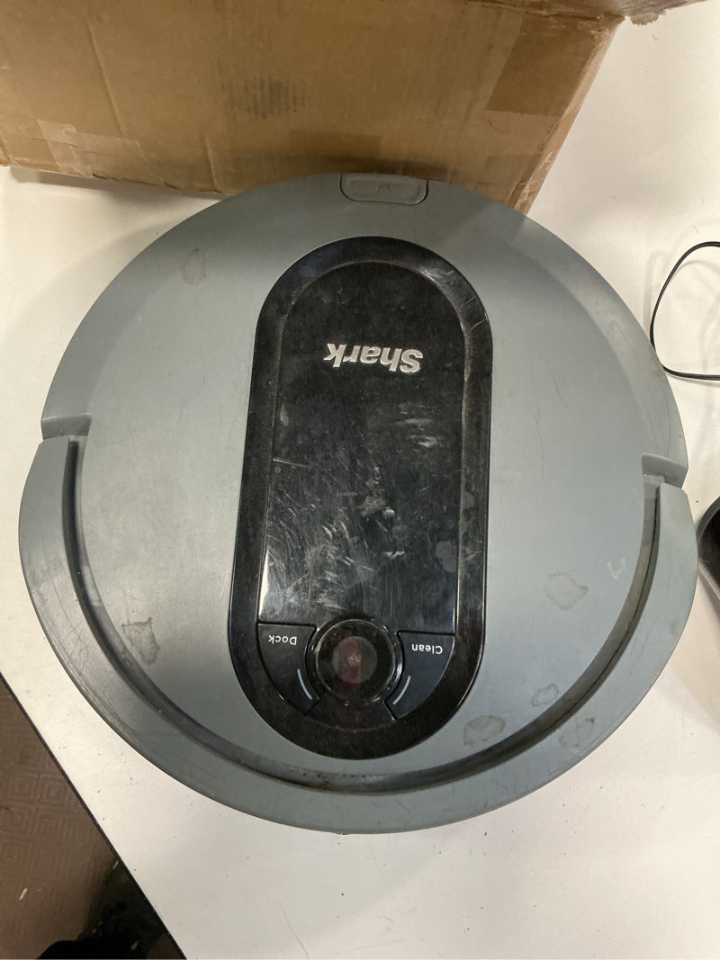 Condition photo showing As Is for Shark IQ Robot Vacuum AV970 Self Cleaning Brushroll, Advanced Navigation, Perfect for Pet Hair, Works with Alexa, Wi Fi, xl dust bin, A black finish