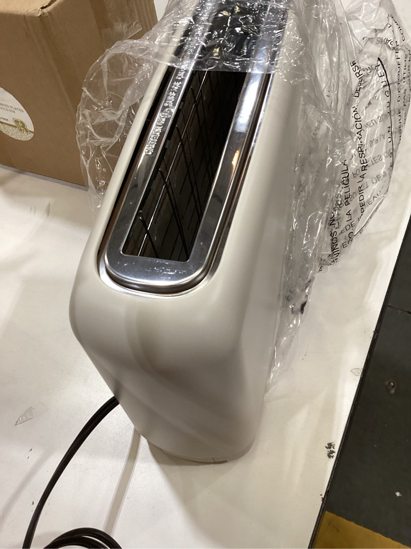 Condition photo showing As Is for bella 2 Slice Slim Toaster, Fits-anywhere™ Kitchenware, 6 Setting Shade Control with Reheat & Cancel Buttons, Fits sourdough, 10” Long Slot, Anti Jam & Auto Shutoff, 900 Watt, Oatmilk 2 Slice Oatmilk