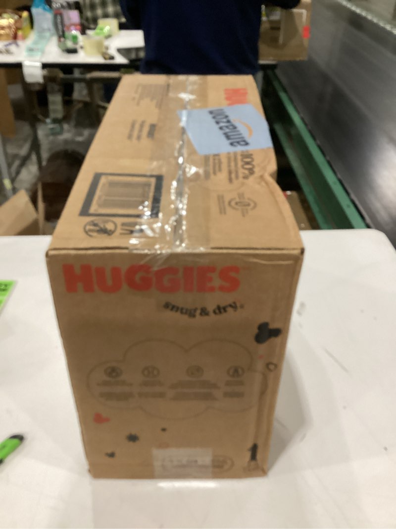 Condition photo showing New/Like New for Huggies Size 1 Diapers, Snug & Dry Newborn Diapers, Size 1 (8-14 lbs), 256 Count (4 Packs of 64), Packaging May Vary
