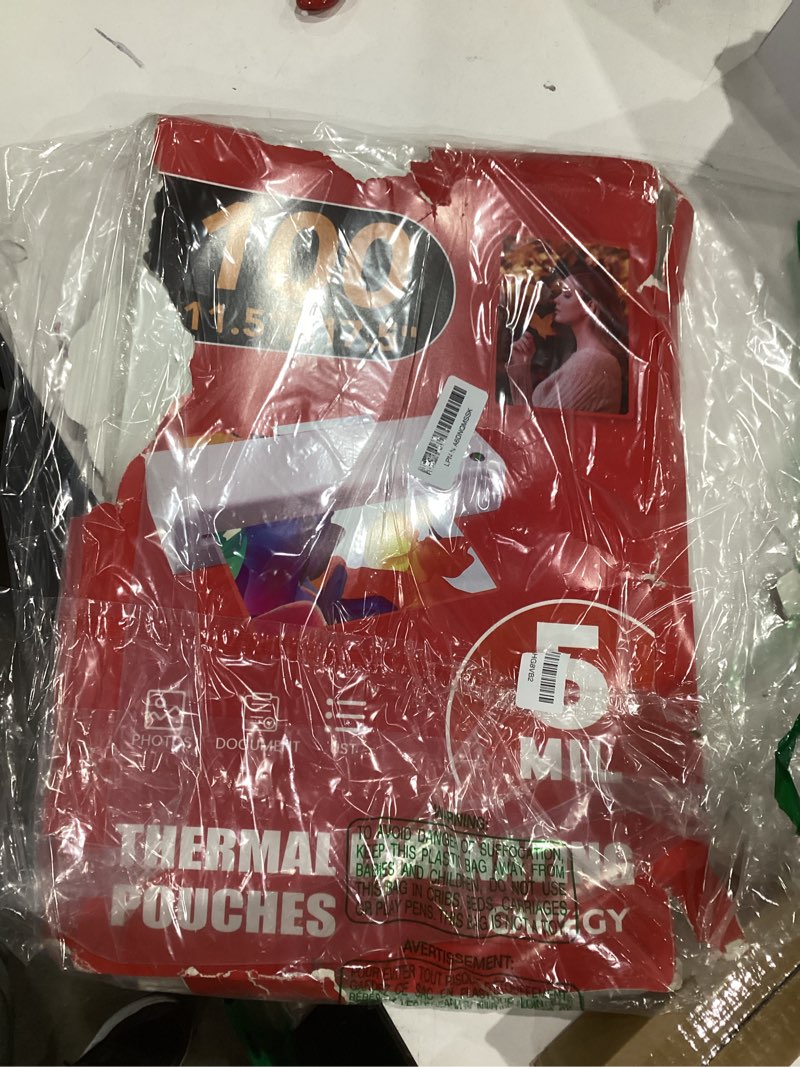 Condition photo showing As Is for (Box ripped)  CAREGY 100 Pack Laminating Sheets, Hold 11 x 17 Inch Sheet, 5 Mil Clear Thermal Laminating Pouches 11.5 x 17.5 Inch Lamination Sheet Paper for Laminator, Round Corner 100PACK-5Mil (11.5 x 17.5Inches)