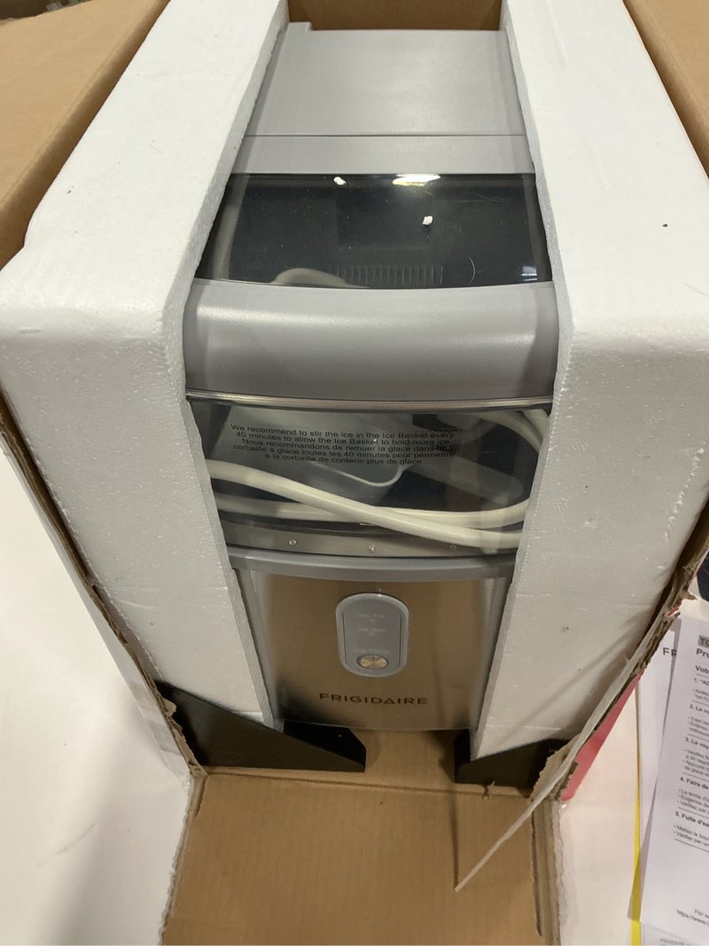 Condition photo showing As Is for Frigidaire Countertop Crunchy Chewable Nugget Ice Maker, Compact, 33lbs per Day, Metallic Finish