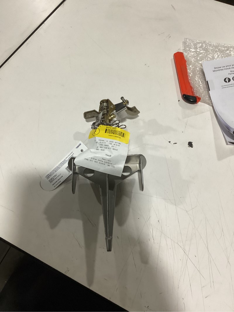 Condition photo showing As Is for orbit 6200-sq ft impulse spike lawn sprinkler