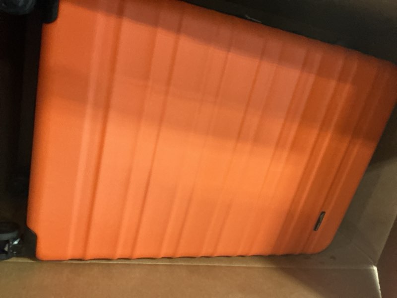Condition photo showing Good Condition for amazon basics 30" hardside large checked luggage, hardshell suitcase with wheels, expandable for up to 15% more space, with scratch-resistant surface, four multi-directional wheels, orange orange large checked
