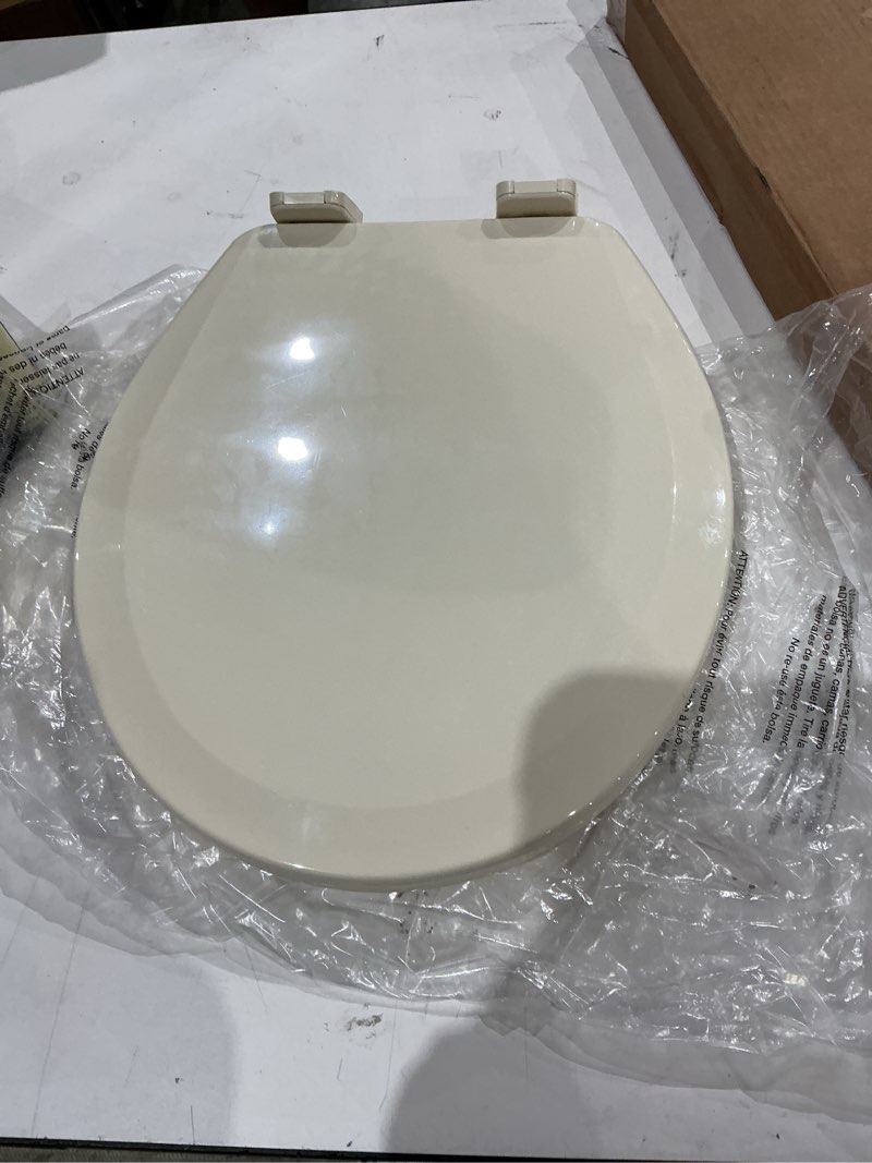 Condition photo showing Good Condition for 1f1r3-01 deluxe molded wood round toilet seat with adjustable top mount hinge, bone