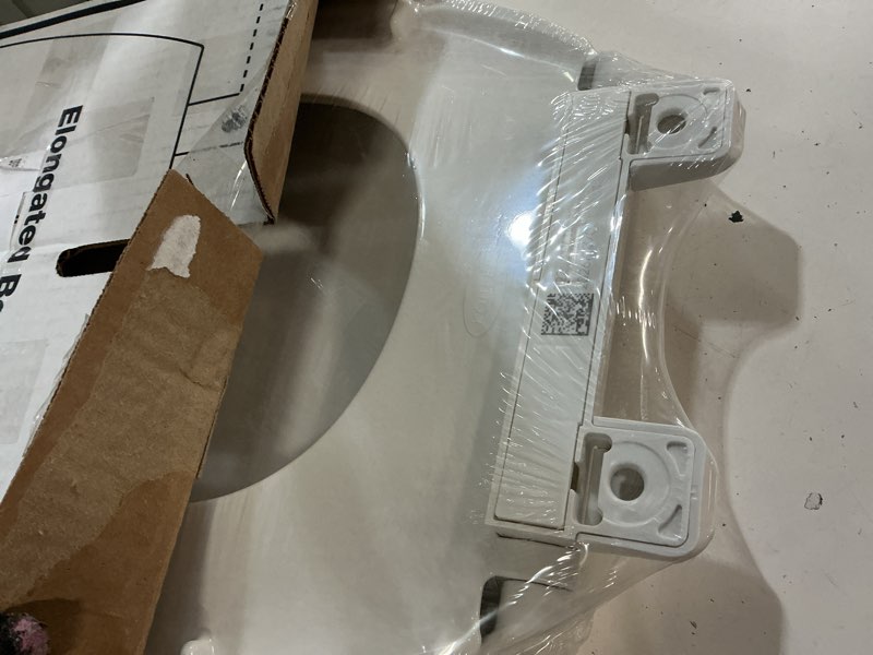 Condition photo showing New/Like New for kohler k-20110-0 brevia elongated toilet seat with grip-tight bumpers, quiet-close seat, quick-attach hardware, white