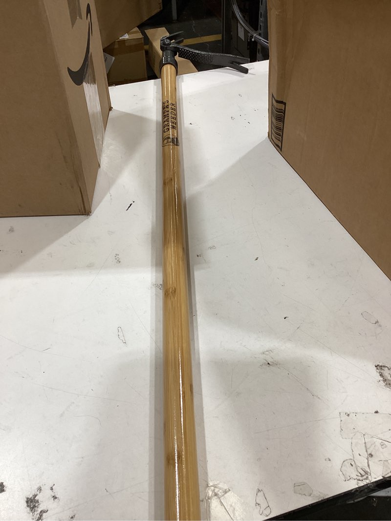 Condition photo showing As Is for grampa's weeder - the original stand up weed puller tool with long handle - made with real bamboo & 4-claw steel head design - easily remove weeds without bending, pulling, or kneeling.