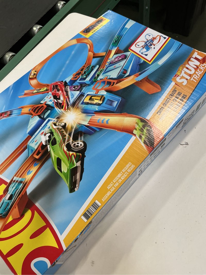 Condition photo showing New/Like New for Hot Wheels Toy Car Track Set, Criss Cross Crash with 1:64 Scale Vehicle, Powered by a Motorized Booster (Amazon Exclusive)
