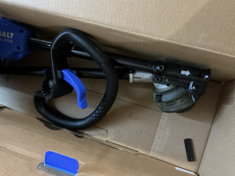 Condition photo showing As Is for kobalt 24-volt 15-in split shaft attachment capable battery string trimmer 4 ah (battery and charger included)