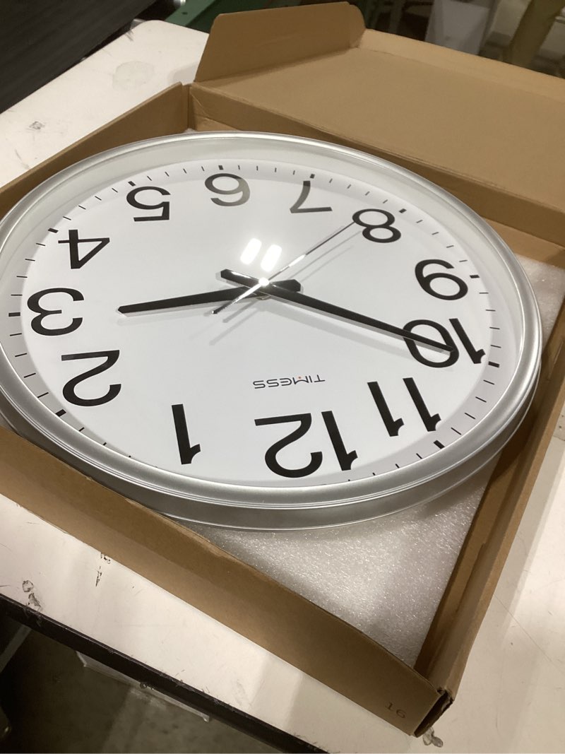 Condition photo showing Good Condition for Navaris 24 Hour Wall Clock - 11.8" Analog Military Time Clock with Silent Movement Non-Ticking Hands - Battery Operated - Silver Frame with Black Face Silver / Black