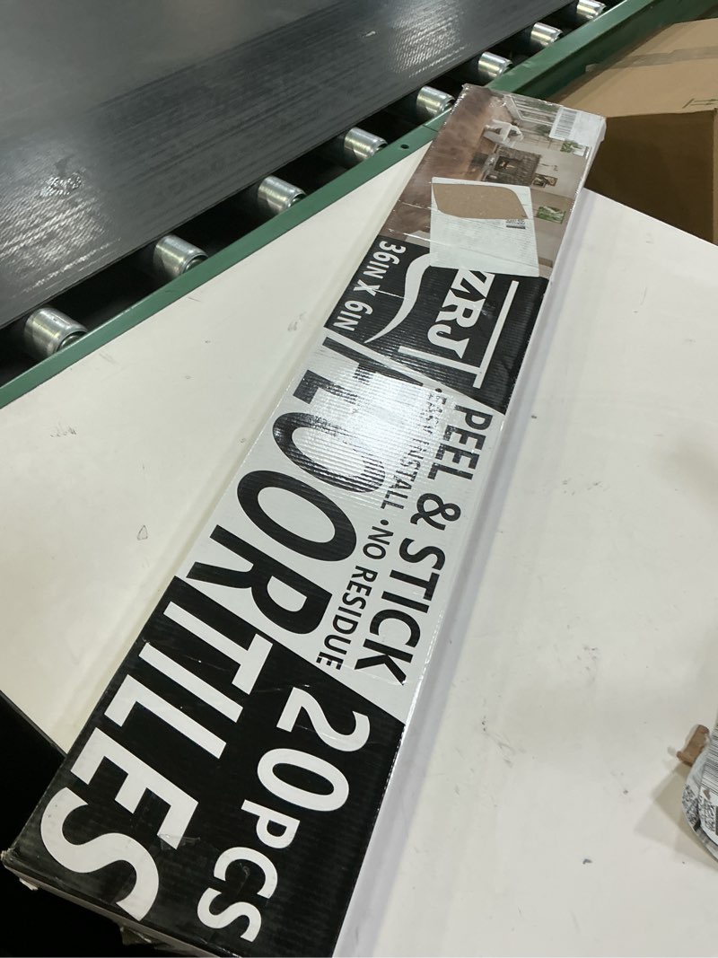 Condition photo showing New/Like New for 30 Sq.Ft. Peel and Stick Vinyl Floor Tiles 36" x 6" Wood Look Planks, 20 Pack Waterproof Self-Adhesive Flooring Tiles, DIY for Renter, Kitchen, Living Room, RV, Washed White 36x6 Inch Washed White 20