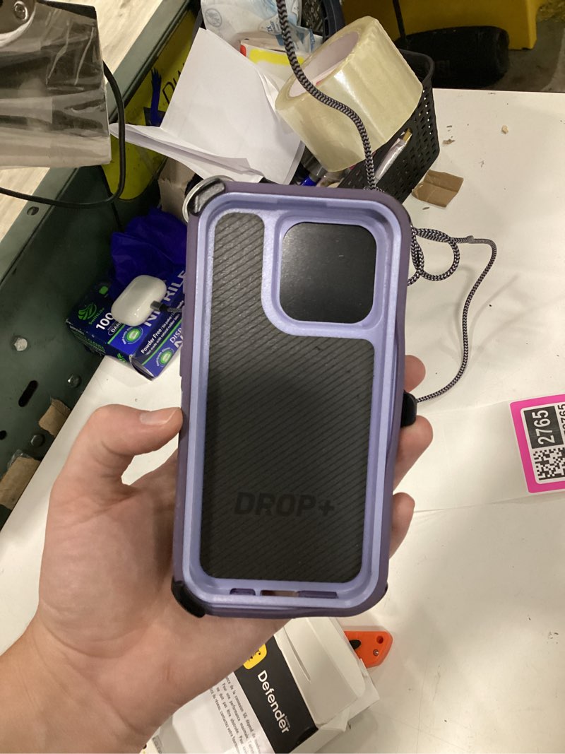 Condition photo showing As Is for otterbox iphone 15 pro defender series case - mountain majesty (purple), screenless, rugged & durable, with port protection, wireless charging compatible, multi-layer impact absorbing iphone case