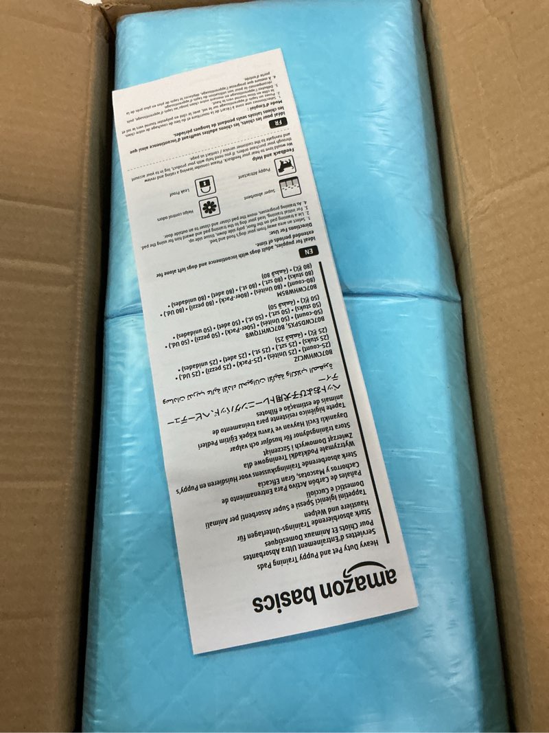 Condition photo showing New/Like New for amazon basics heavy duty dog and puppy pee pads, leak-proof 5-layer super absorbent, quick-dry surface for potty training, regular size, 24x23", blue & white, 50 count regular 50 count