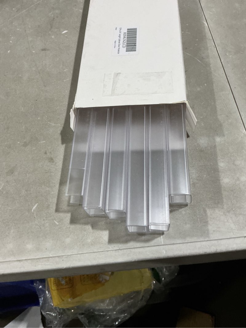 Condition photo showing Good Condition for cabinet protector edge guard (pack of 12), 24" clear pvc cabinet edge protectors for 3/4" thick kitchen cabinets doors – slip-on no-tool sliding installation 24 inches 12