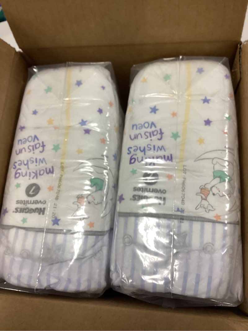 Condition photo showing New/Like New for huggies overnites size 7 overnight diapers (41+ lbs), 36 ct, packaging may vary size 7 36