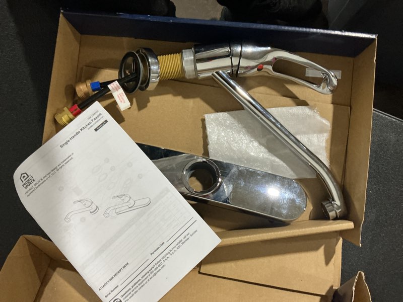 Condition photo showing As Is for project source wakebridge polished chrome single handle deck-mount kitchen faucet (includes deck plate)