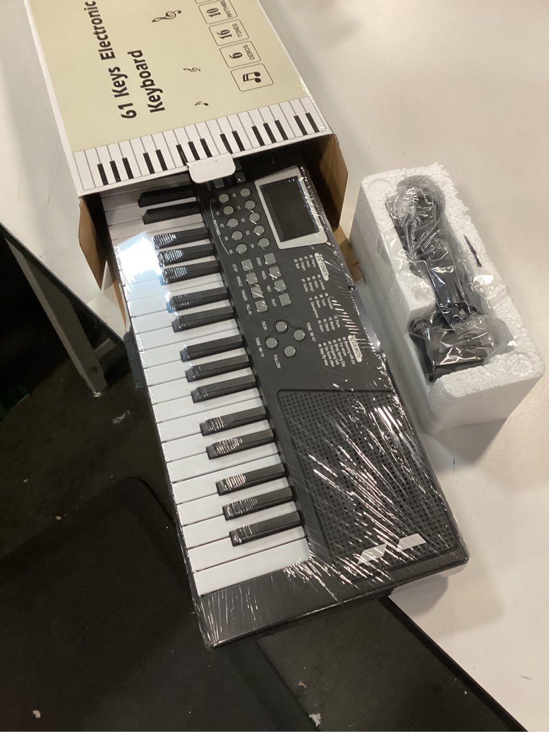 Condition photo showing New/Like New for 61 key piano keyboard - Electric Keyboard Piano with Microphone, Music Stand, Built-In Speakers - Portable Digital Piano for Beginners, Ideal Gift & Learning