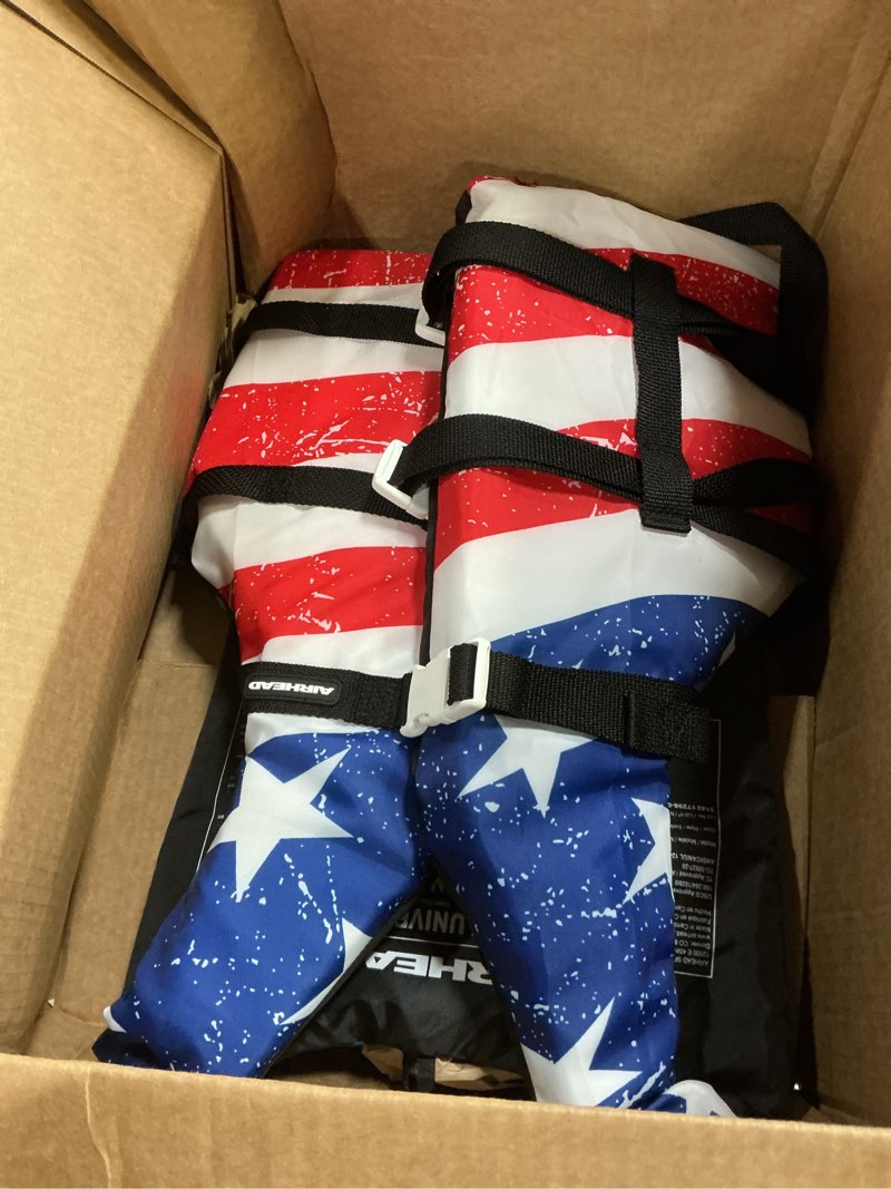 Condition photo showing Good Condition for Sportstuff Type III Life Jacket US Coast Guard Approved Open Sides with 3 Body Belts & Buckles Quick Dry Fabric, Secure Fit, Comfortable Stars & Stripes Jacket Adult