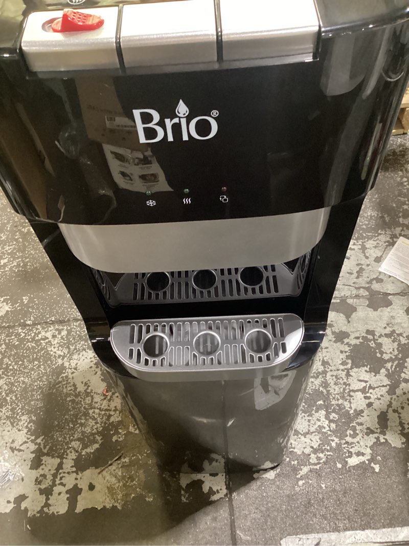 Condition photo showing As Is for brio bottom loading water cooler dispenser for 5 gallon bottles - 3 temperatures with hot, room & cold spouts, child safety lock, led display with empty bottle alert, stainless steel