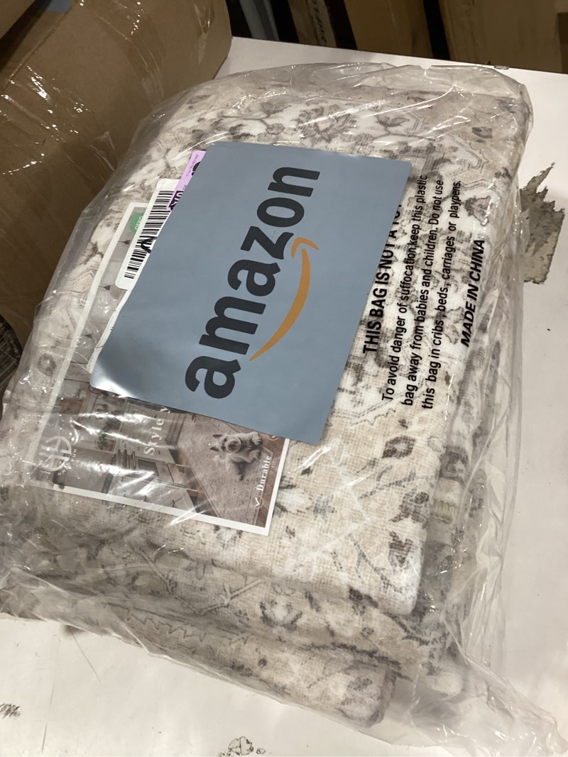 Condition photo showing New/Like New for similiar product luxe weavers rug distressed floral oriental area rug, non-shedding stain resistant rug, cream 5x7 (6495 cream 5x7 b)