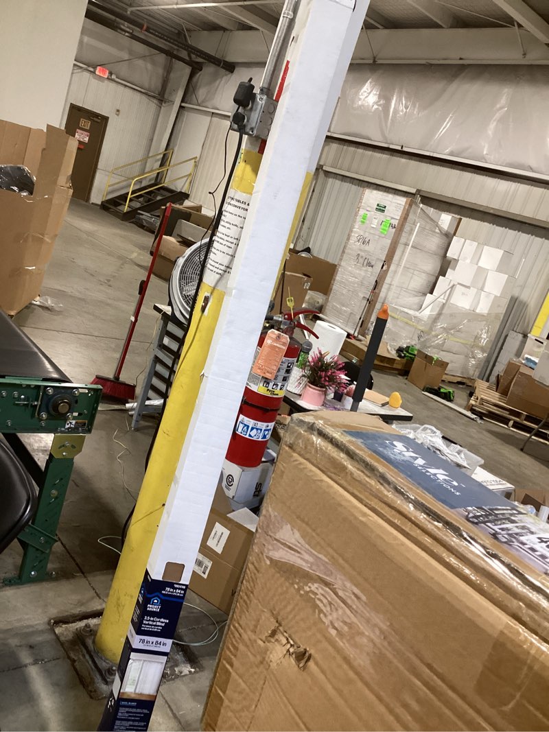 Condition photo showing As Is for project source light filtering vertical 3.5-in slat width 78-in x 84-in cordless white vinyl light filtering vertical blinds