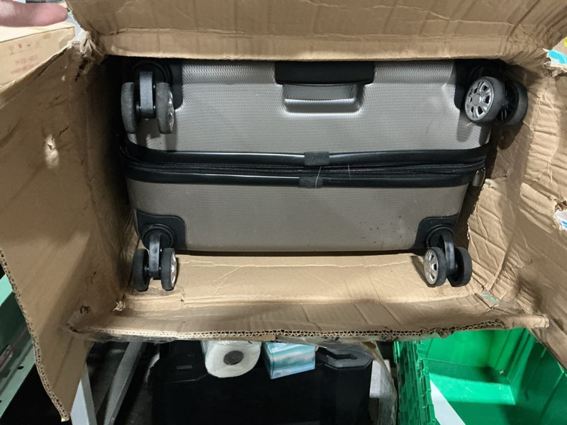 Condition photo showing As Is for Rockland Melbourne Hardside Expandable Spinner Wheel Luggage, Silver, 3-Piece Set (20/24/28) 3-Piece Set (20/24/28) Silver