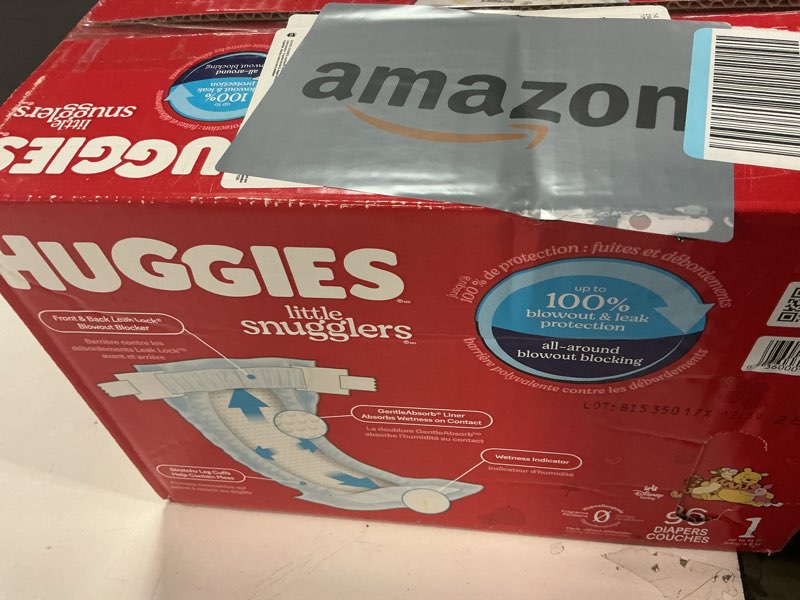 Condition photo showing New/Like New for Huggies Size 1 Diapers, Little Snugglers Baby Diapers, Size 1 (8-14 lbs), 96 Count, Packaging May Vary