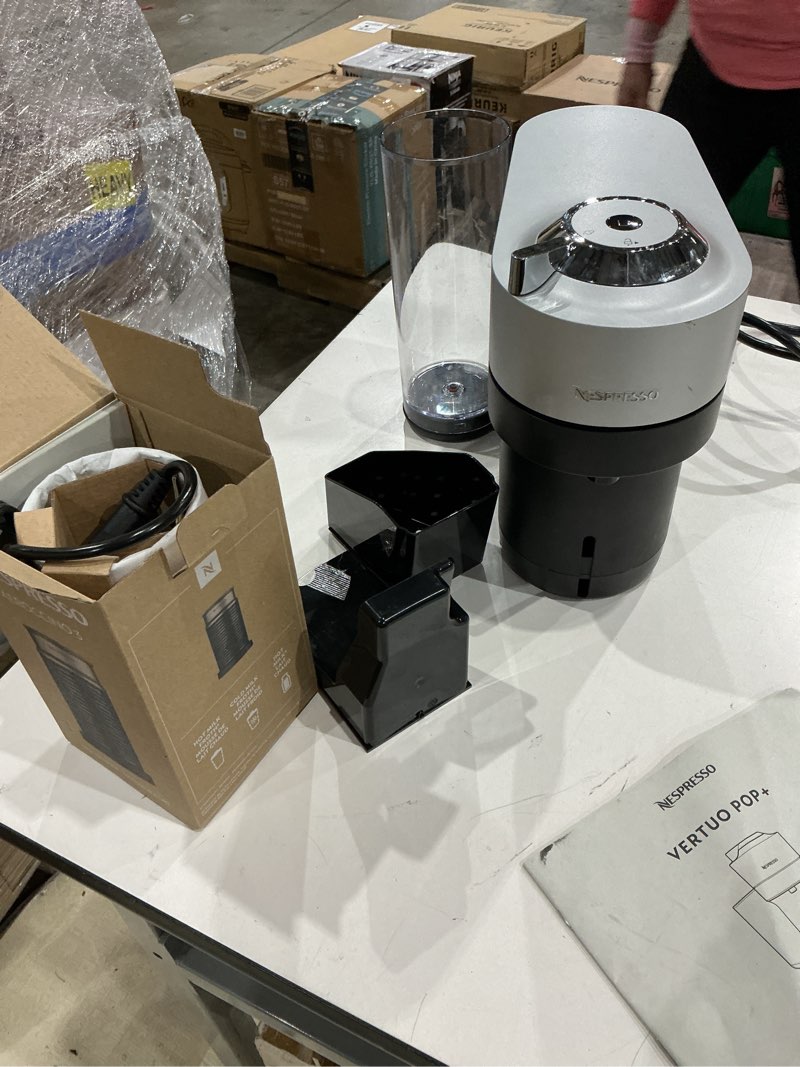 Condition photo showing As Is for nespresso vertuo pop+ deluxe by de'longhi with aeroccino, silver machine + frother silver