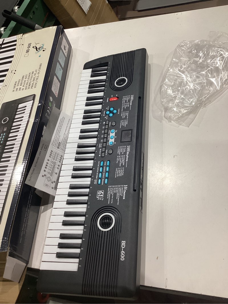 Condition photo showing As Is for iten incomplete))))61 key keyboard piano,portable electronic digital piano,built in dual speakers,external microphone,power plug,rich teaching content,multi-functional electronic piano suitable for beginners black