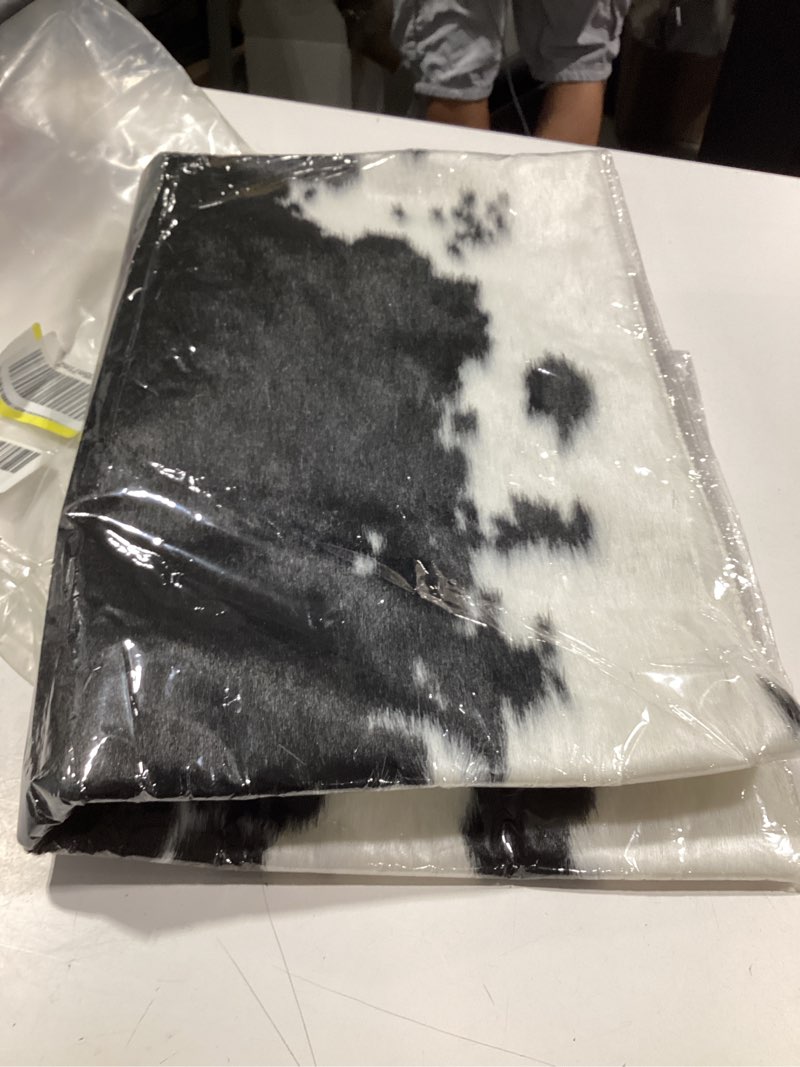 Condition photo showing New/Like New for comeet faux cowhide rug 4 x 3 feet, medium cow rug thickened cow print rug, non-slip faux animal printed area rug western decor carpet for living room bedroom, black black 2'11" x 3'11" (cow print)
