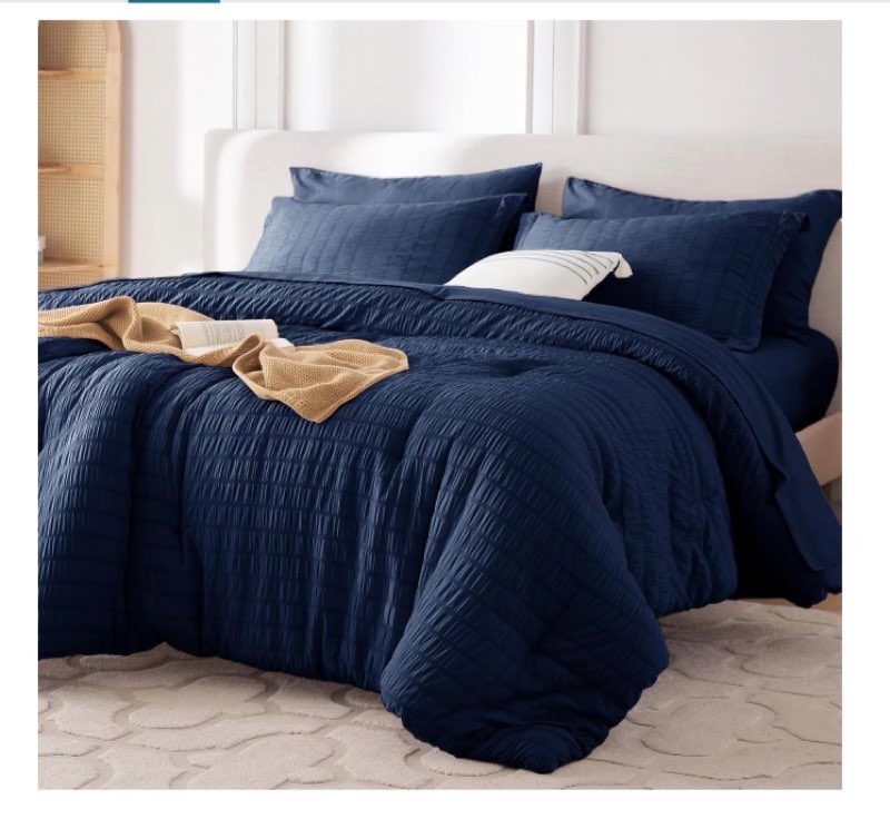 Blue comforter and sheet set, size unknown 
