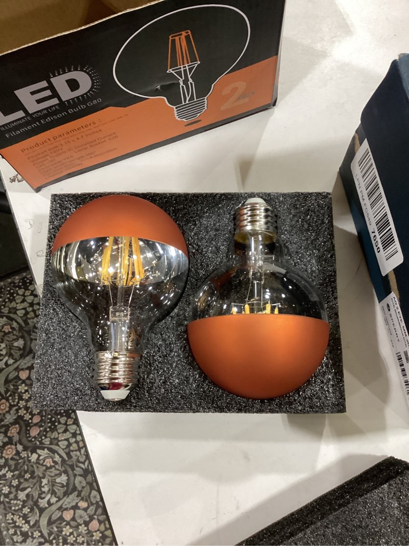 Condition photo showing Good Condition for Half Chrome Light Bulbs,Half Brown Tipped Dimmable 6W (Equ, 60Watt) LED Ediosn Light Bulbs,Soft White 2700K,G80/G25 Shape Anti-Glare,Decorative Mirror,CRI 90+ E26 Base (Pack of 2)
