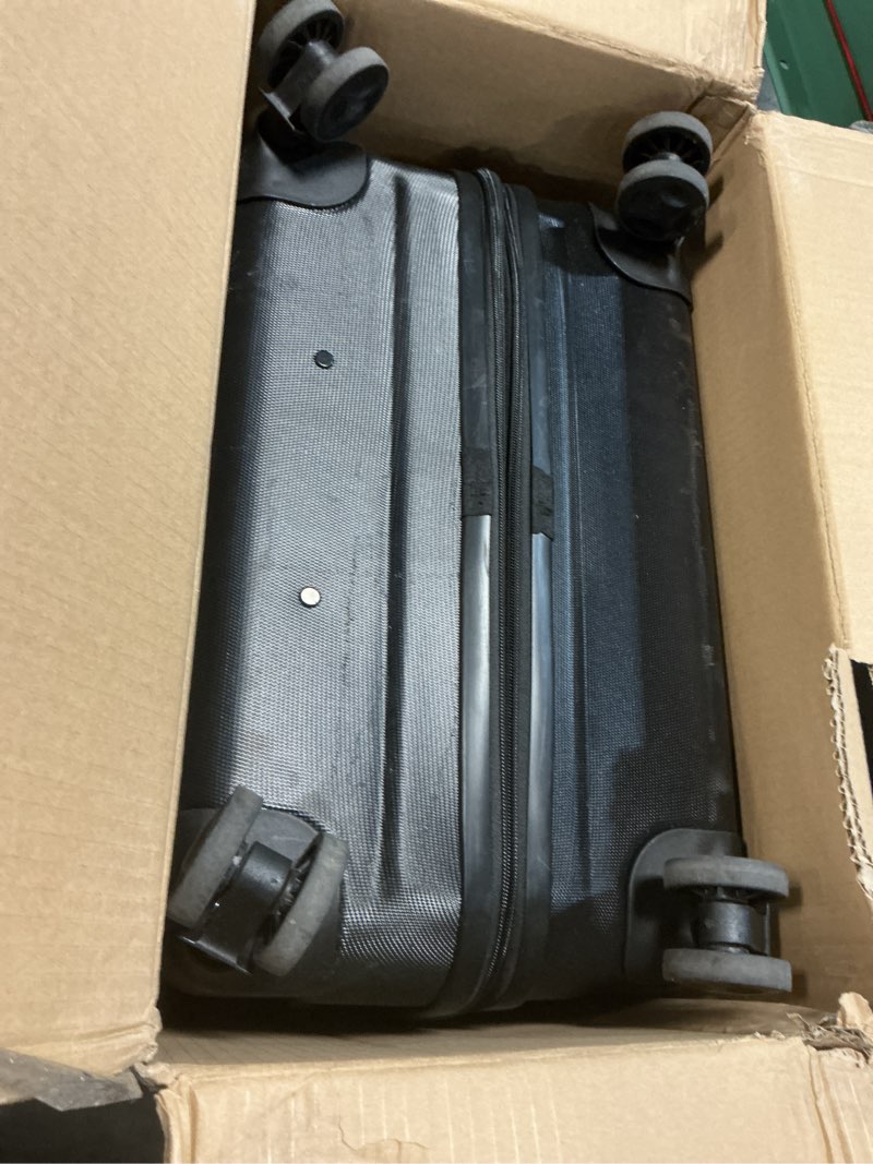Condition photo showing As Is for Amazon Basics 30" Hardside Large Checked Luggage, Hardshell Suitcase With Wheels, Expandable For Up to 15% More Space, With Scratch-Resistant Surface, Four Multi-directional Wheels, Black Black Large Checked