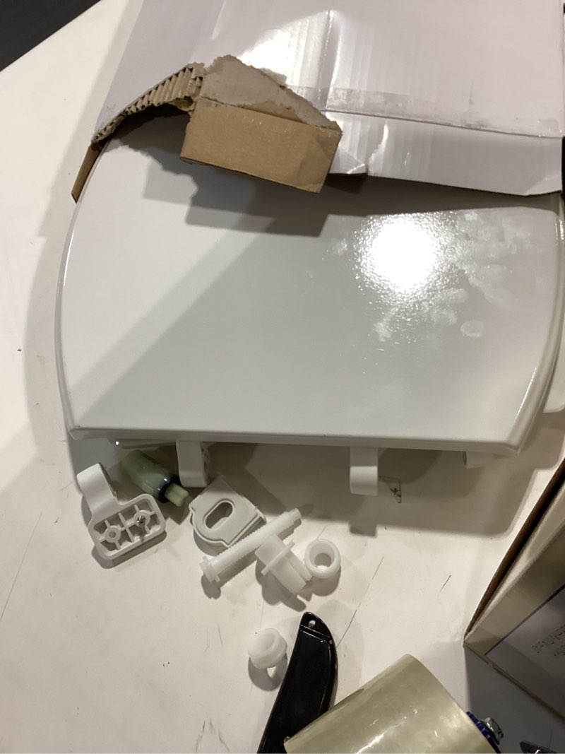 Condition photo showing Good Condition for american standard moments wood white elongated soft close toilet seat