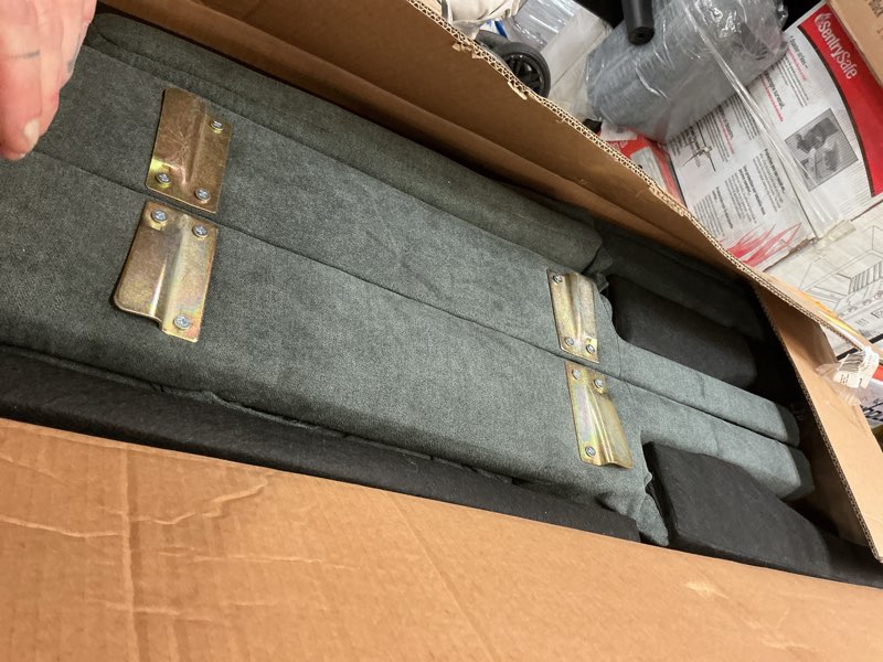 Condition photo showing As Is for mainstays 73" storage futon, charcoal