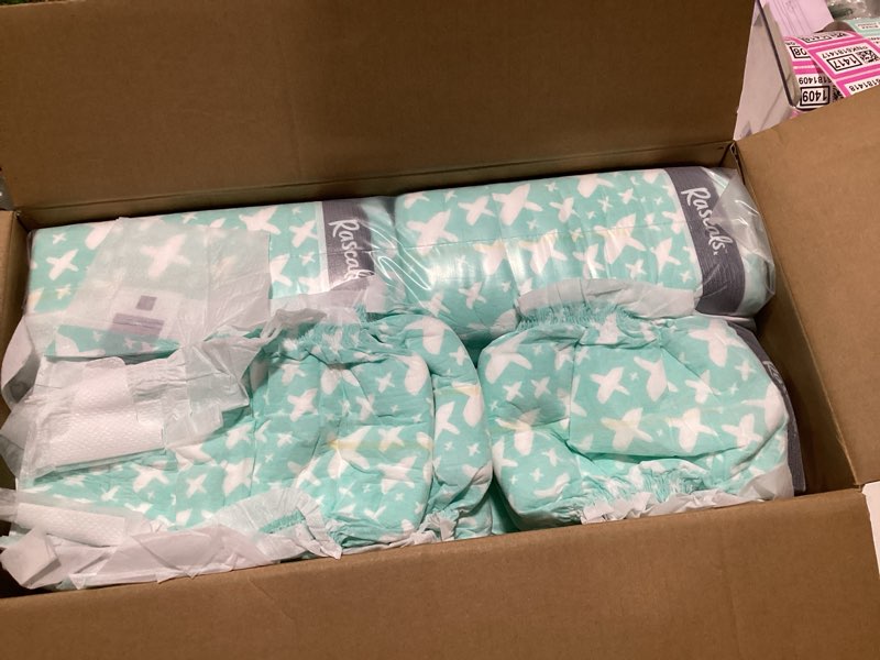Condition photo showing As Is for rascals premium absorbent baby diapers size 6, 112 count