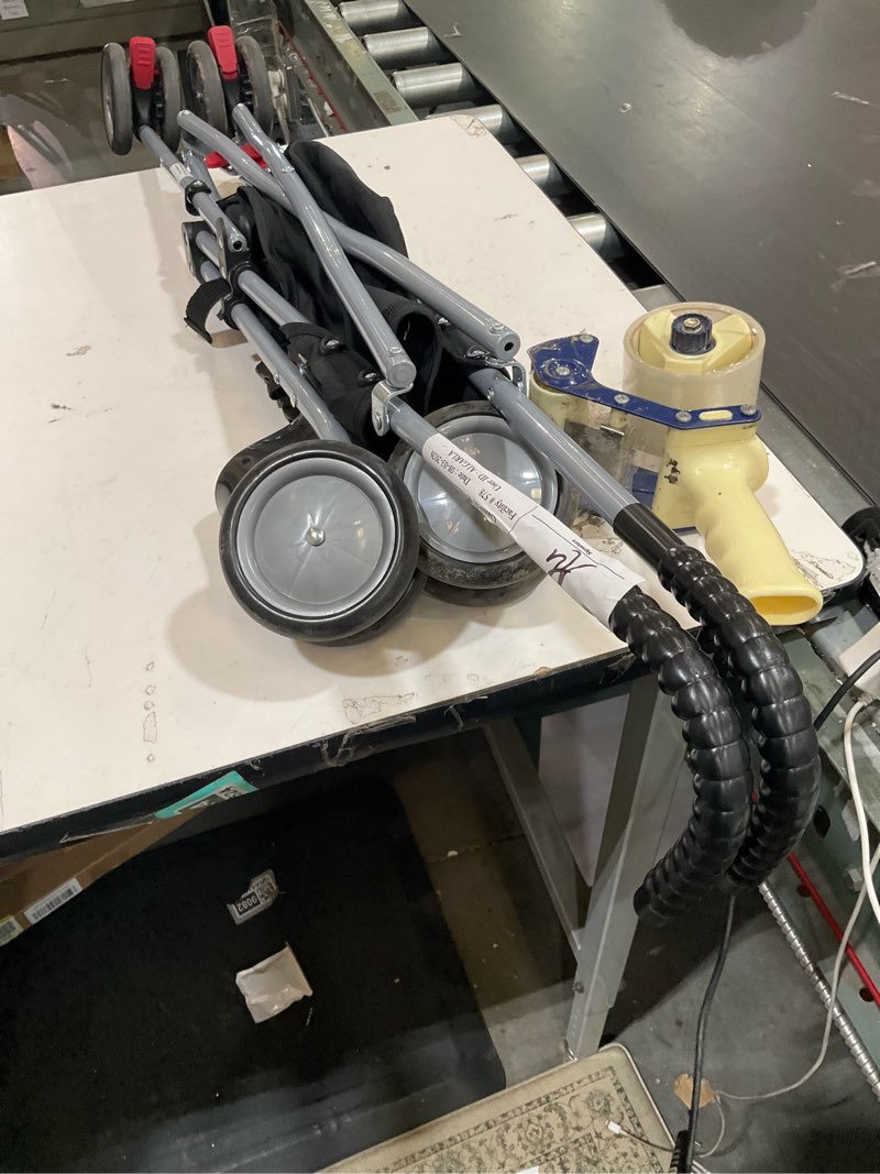 Condition photo showing As Is for stroller