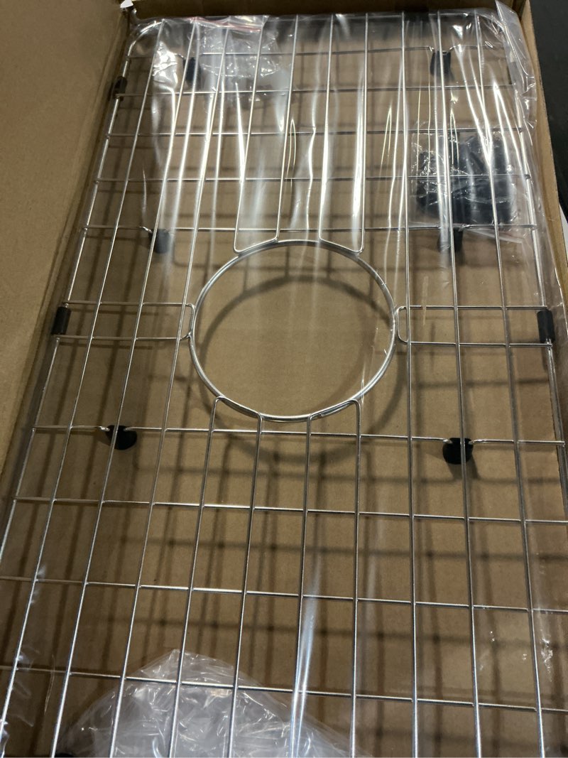 Condition photo showing New/Like New for Serene Valley Sink Bottom Grid 24-1/8" x 12-5/8", Centered Drain with Corner Radius 1-1/2", Sink Protector NLW2412C