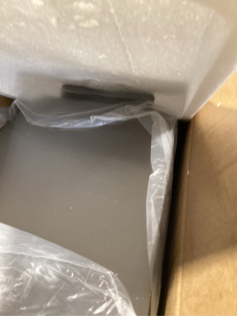 Condition photo showing New/Like New for home zone living 4 gallon slim kitchen trash can with soft close lid and step pedal, stainless steel wastebasket with removable liner, silver silver solid
