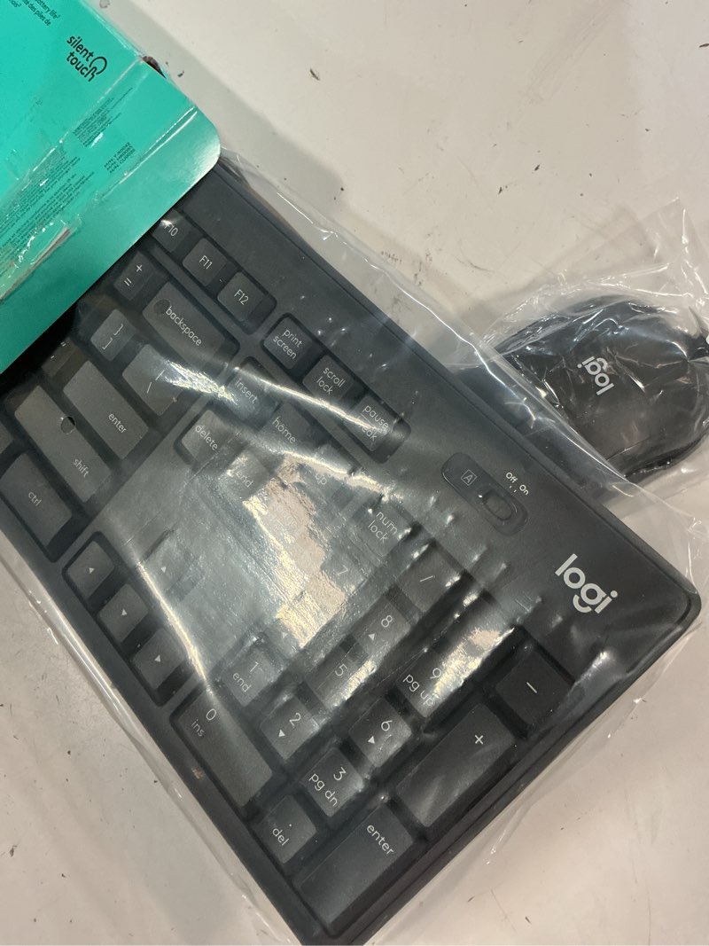 Condition photo showing Good Condition for logitech mk295 wireless mouse & keyboard combo with silenttouch technology, full numpad, advanced optical tracking, lag-free wireless, 90% less noise - graphite