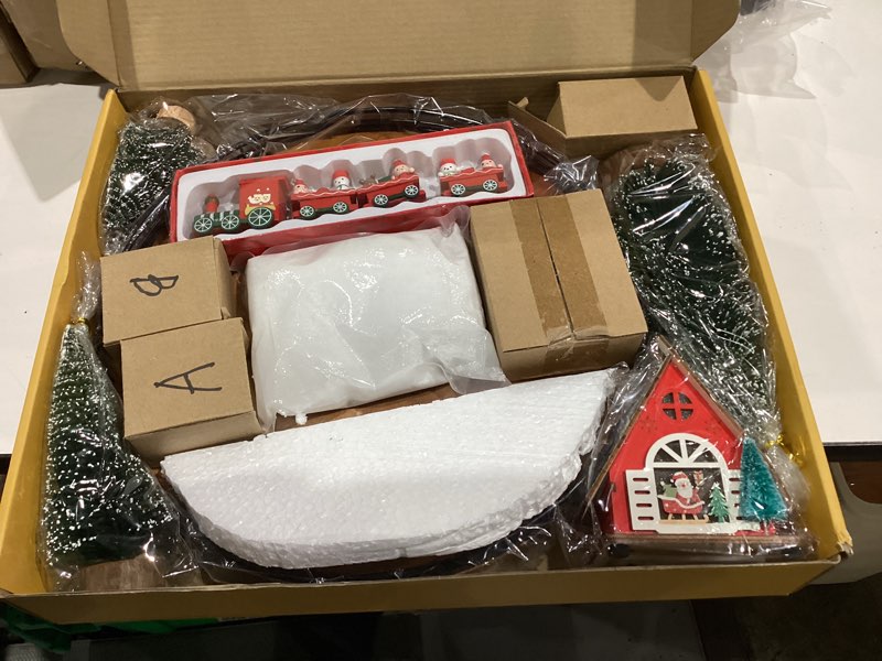 Condition photo showing New/Like New for AMH 12 PCS Christmas Table Decorations Set with Oak Rotating Base – Xmas Town Village Centerpiece with Santa, Train, House, Trees & Figurines, Tabletop Decorations for Holiday Dining & Coffee Tables