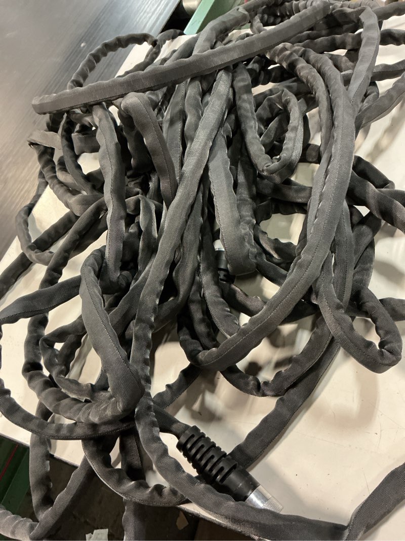 Condition photo showing As Is for zero-g teknor apex 5/8-in x 50-ft premium -duty kink free woven gray hose