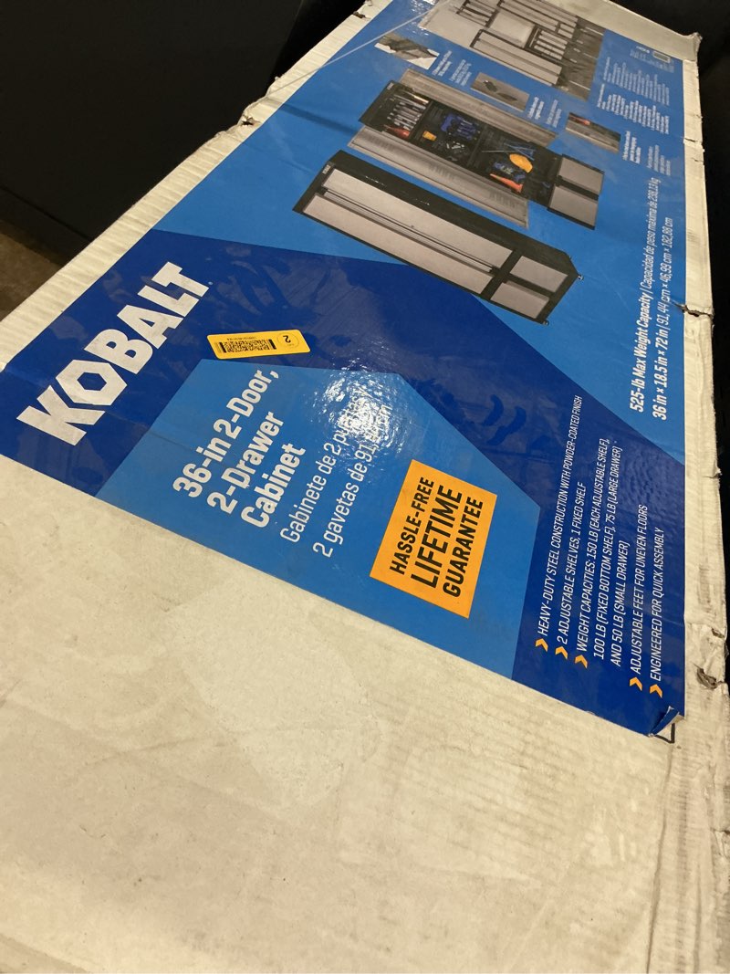 Condition photo showing As Is for kobalt 36-in w x 72-in h x 18.5-in d freestanding steel garage cabinet in silver